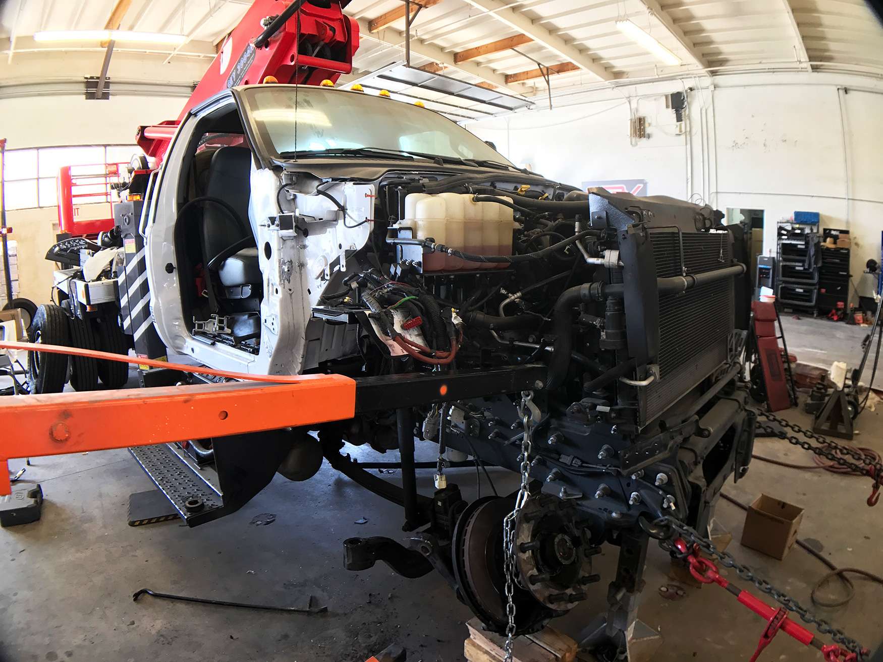 Box truck with rear body damage under repair