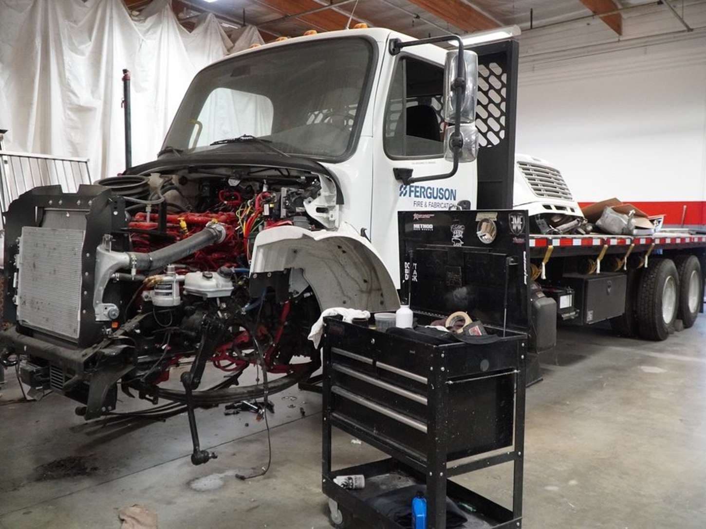 Trailer axle and brake assembly on the service floor