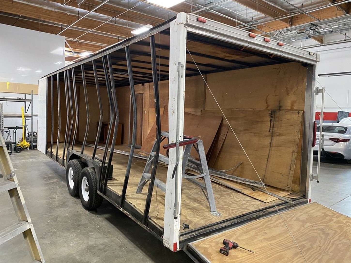 Toy hauler with the rear ramp door open