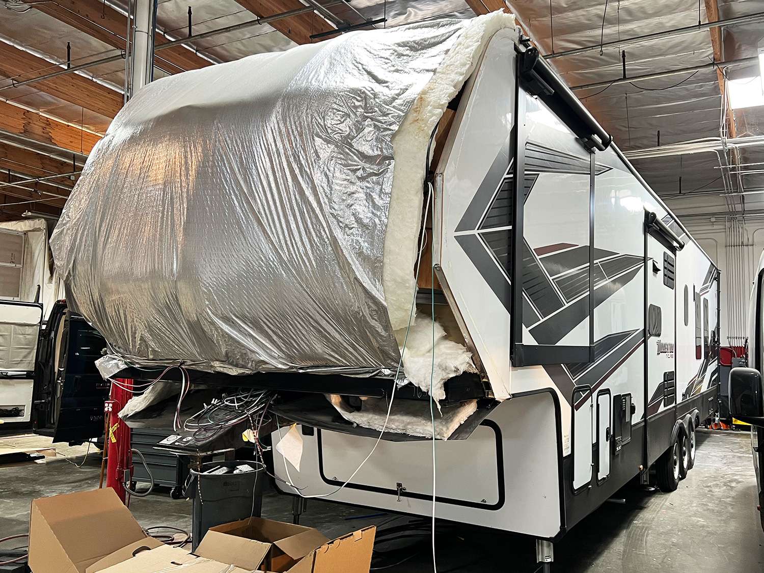 Front cap removed from a fifth wheel for replacement