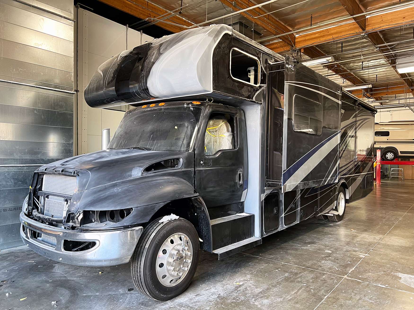 Heavily damaged coach evaluated for repairability