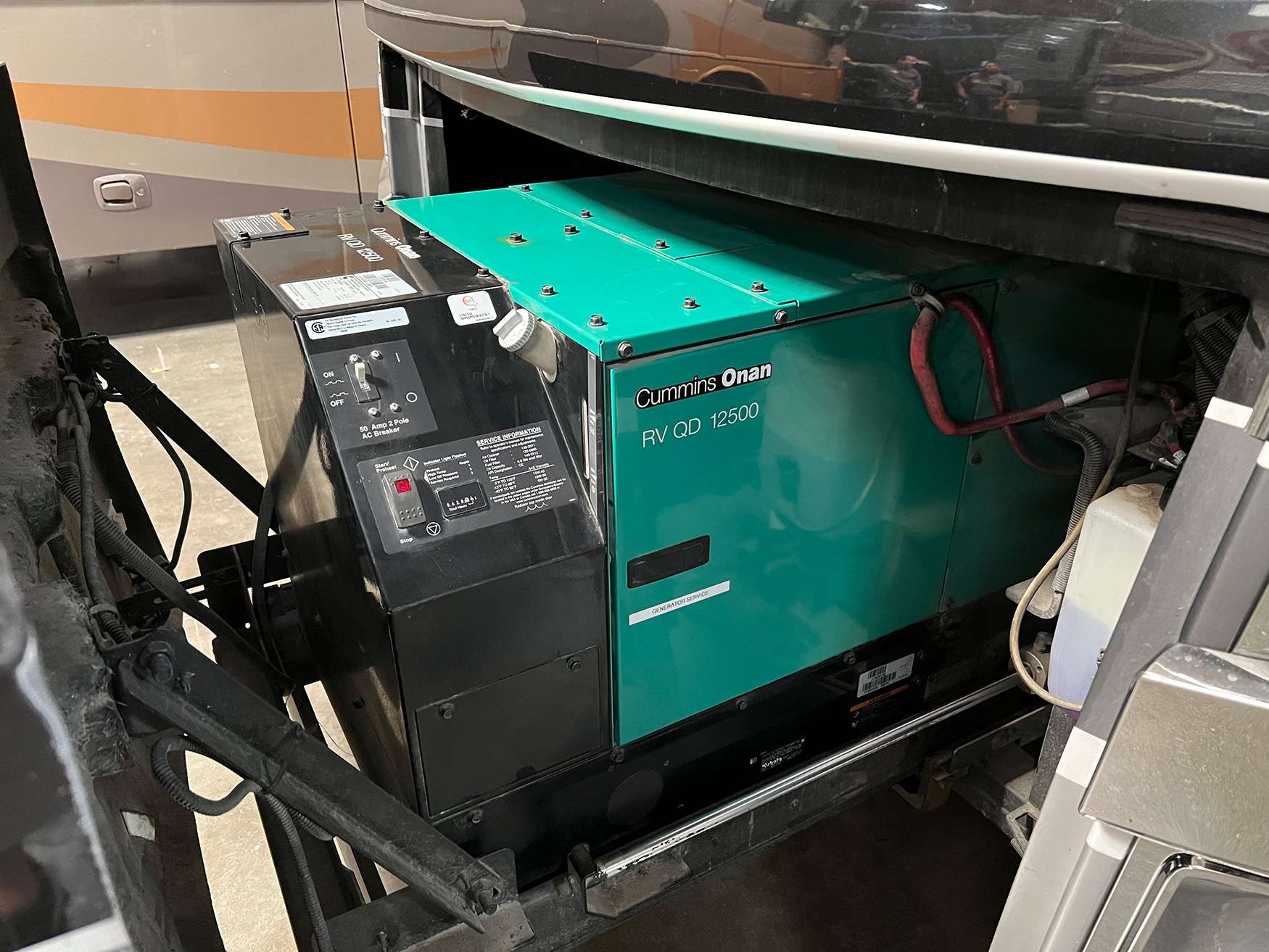 Onboard generator slid out for service access