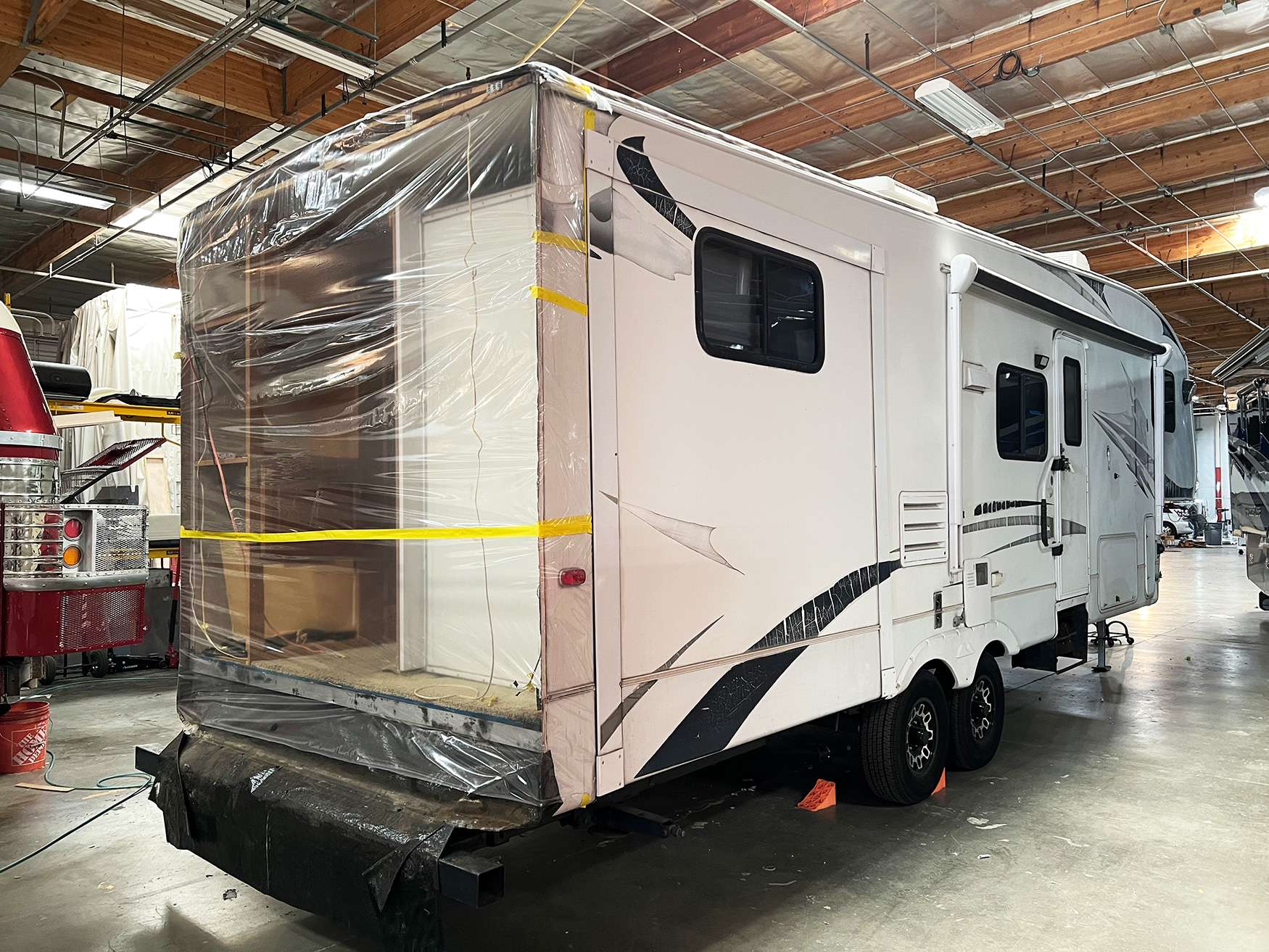 Park model trailer on site for exterior repair